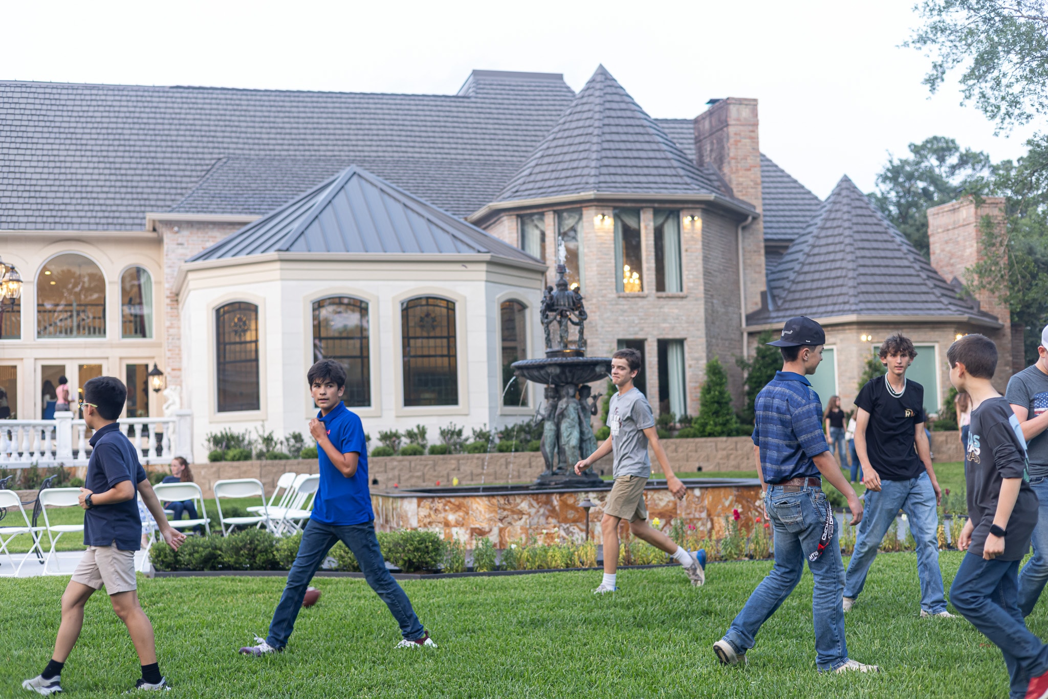 YAF Houston students playing football at estate