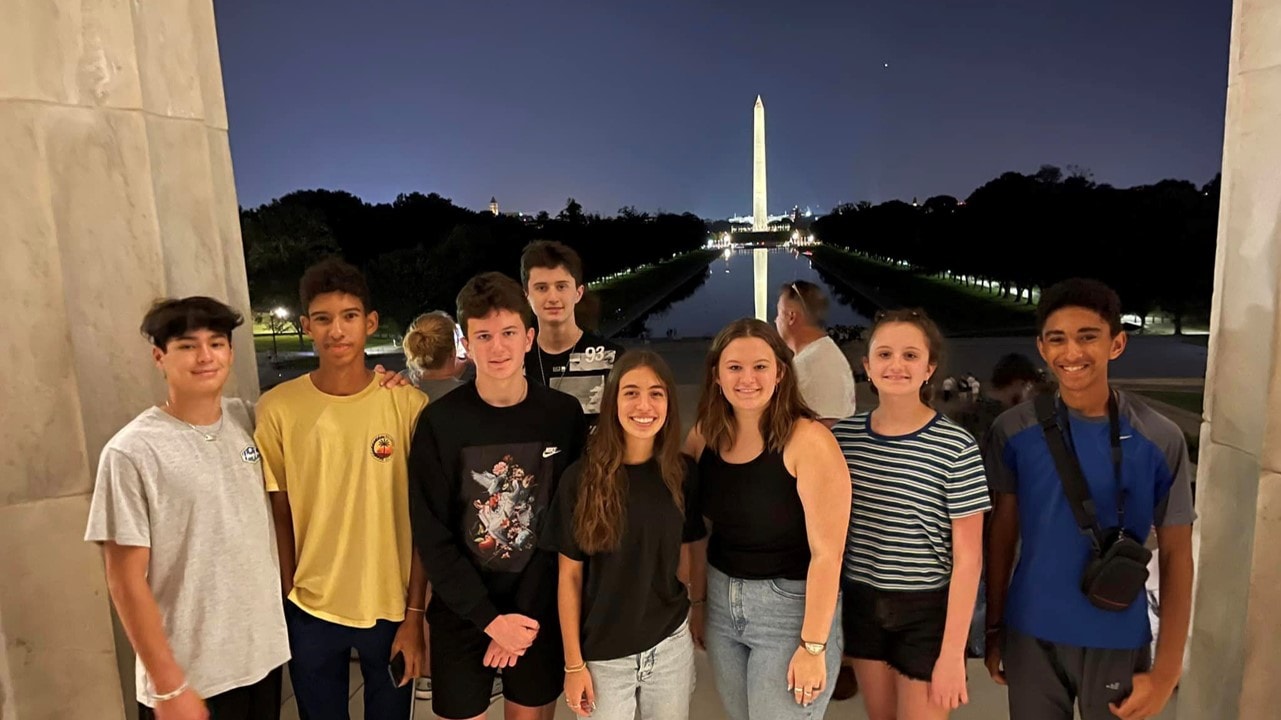 YAF Houston students at the Washington Monument at night