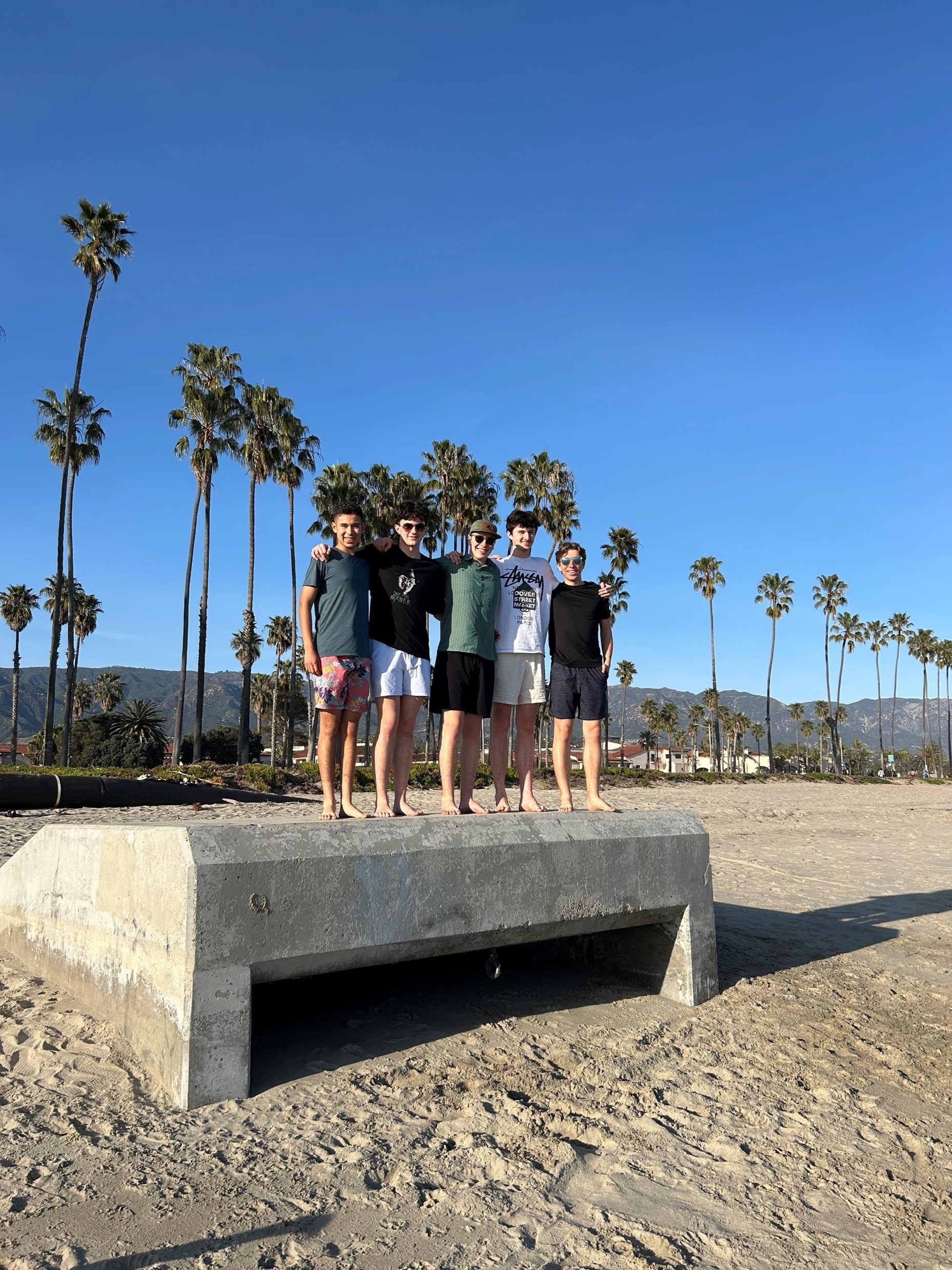 YAF Houston students on Santa Barbara beach with palm trees